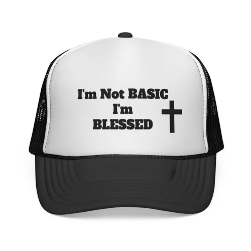 I'm Not Basic, I'm Blessed adjustable snapback trucker cap with the message Above average. Deeply favored. Uniquely blessed.